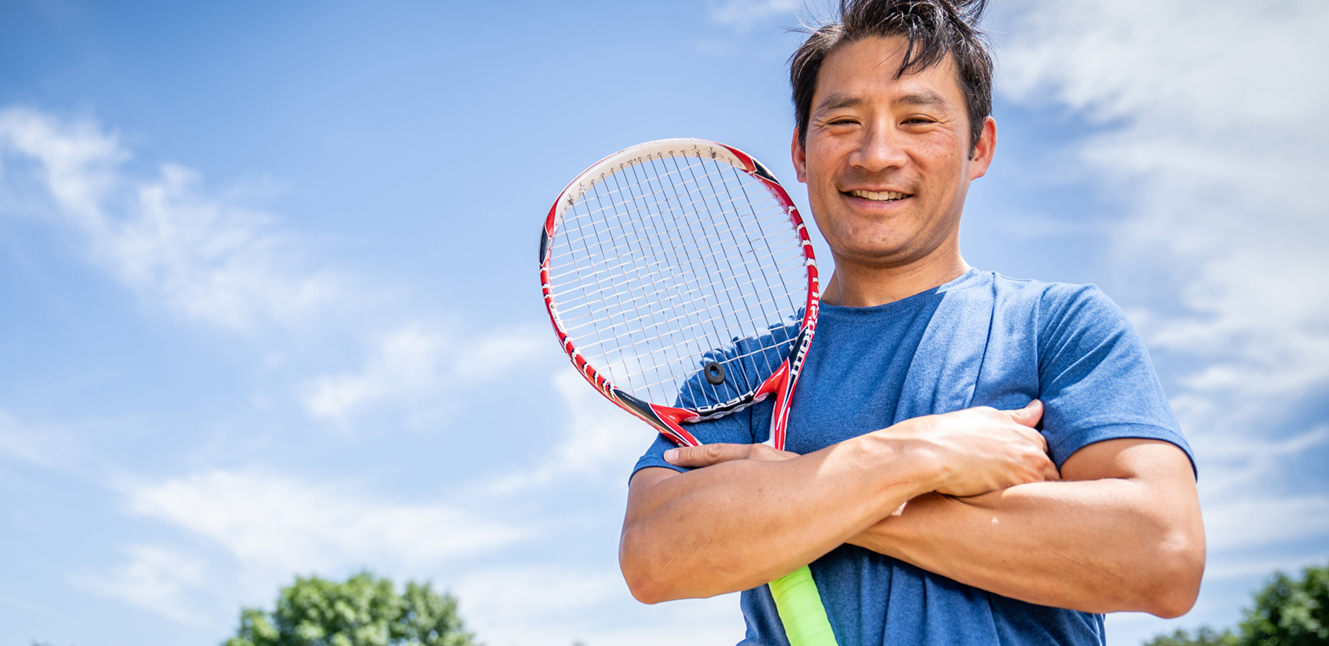 Man holding a tennis racket from PIAS